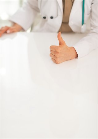 Closeup on medical doctor woman showing thumbs up Stock Photo - Budget Royalty-Free & Subscription, Code: 400-07519157