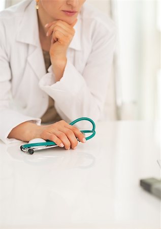 simsearch:400-07519214,k - Closeup on thoughtful medical doctor woman in office Stock Photo - Budget Royalty-Free & Subscription, Code: 400-07519167