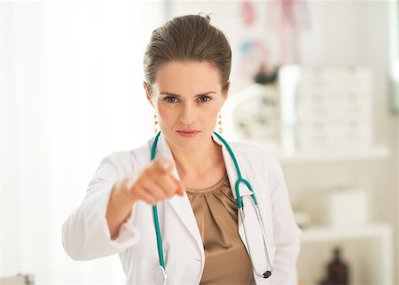 simsearch:400-07099823,k - Portrait of medical doctor woman pointing in camera Stock Photo - Budget Royalty-Free & Subscription, Code: 400-07519188