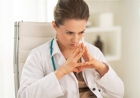 simsearch:400-07519214,k - Portrait of concerned medical doctor woman in office Stock Photo - Budget Royalty-Free & Subscription, Code: 400-07519194