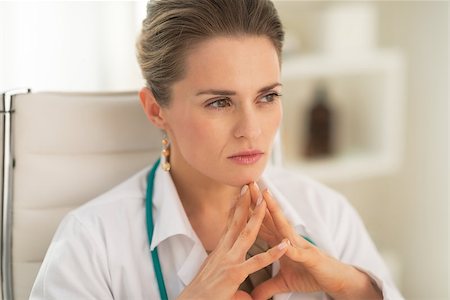 simsearch:400-07519214,k - Portrait of thoughtful medical doctor woman in office Stock Photo - Budget Royalty-Free & Subscription, Code: 400-07519193