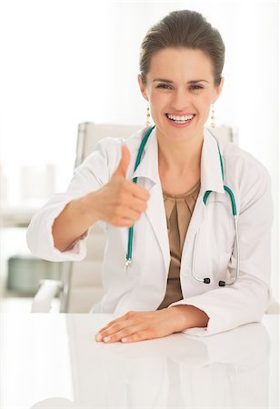 Medical doctor woman showing thumbs up Stock Photo - Budget Royalty-Free & Subscription, Code: 400-07519201