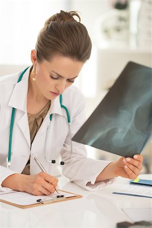 simsearch:400-07519214,k - Medical doctor woman with fluorography working in office Stock Photo - Budget Royalty-Free & Subscription, Code: 400-07519214