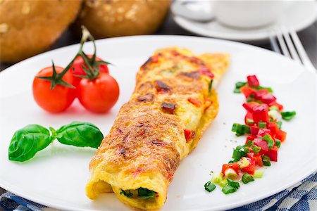 Omelet with vegetables and herbs on a plate Stock Photo - Budget Royalty-Free & Subscription, Code: 400-07510655