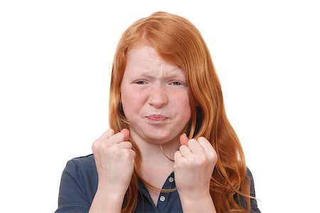 simsearch:400-06561568,k - Portrait of an angry young girl on white background Photographie de stock - Aubaine LD & Abonnement, Code: 400-07511382