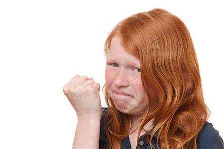 simsearch:400-06561568,k - Portrait of an angry young girl on white background Photographie de stock - Aubaine LD & Abonnement, Code: 400-07511383