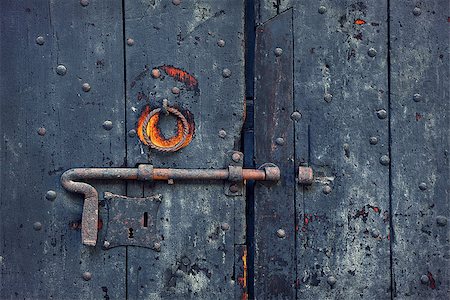 simsearch:400-07556220,k - Closeup image of old wooden door with metal knob and rusty bolt. Stock Photo - Budget Royalty-Free & Subscription, Code: 400-07511802