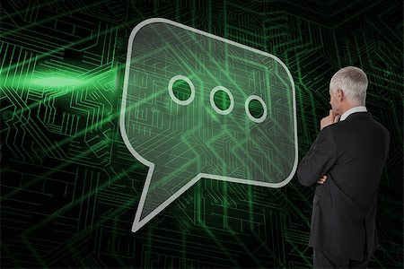 speech bubble with someone thinking - Composite image of speech bubble and businessman looking against green and black circuit board Stock Photo - Budget Royalty-Free & Subscription, Code: 400-07511896