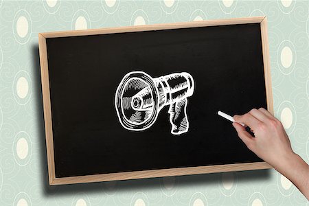 Composite image of hand drawing megaphone with chalk on chalkboard with wooden frame Stock Photo - Budget Royalty-Free & Subscription, Code: 400-07512368