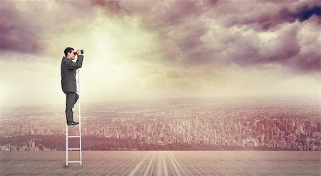 Businessman standing on ladder against balcony overlooking city Stock Photo - Budget Royalty-Free & Subscription, Code: 400-07512392