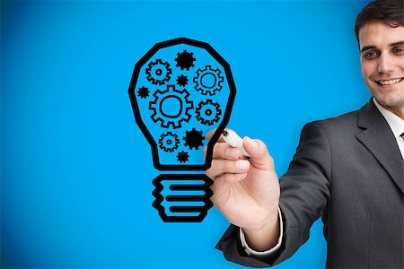 Composite image of businessman drawing light bulb against blue background with vignette Stock Photo - Budget Royalty-Free & Subscription, Code: 400-07512689