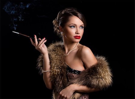 Vintage, retro. Gorgeous woman with a cigarette Stock Photo - Budget Royalty-Free & Subscription, Code: 400-07513644