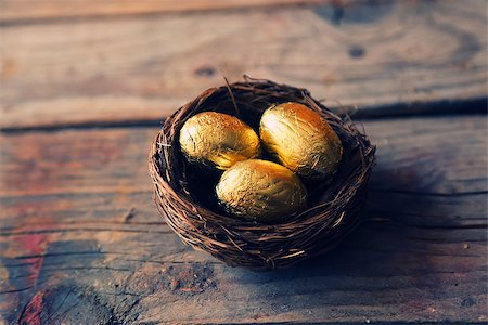 Cute retro photo with gold easter eggs Foto de stock - Royalty-Free Super Valor e Assinatura, Número: 400-07524280