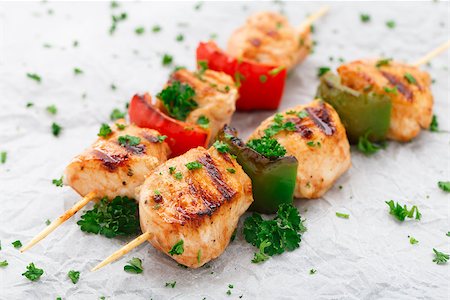 Grilled chicken skewers with paprika and parsley Stock Photo - Budget Royalty-Free & Subscription, Code: 400-07525131
