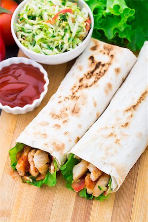 Chicken kebab - wrapped grilled meat and vegetables Stock Photo - Budget Royalty-Free & Subscription, Code: 400-07525297