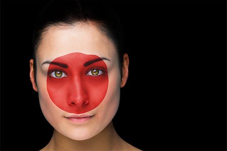 football faces paintings pictures - Composite image of japan football fan in face paint against black Stock Photo - Budget Royalty-Free & Subscription, Code: 400-07525849