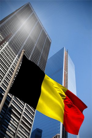 simsearch:400-07525974,k - Belgium national flag against low angle view of skyscrapers Stock Photo - Budget Royalty-Free & Subscription, Code: 400-07525978