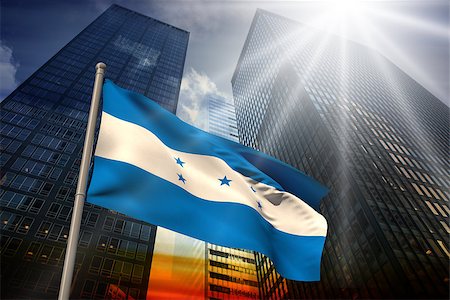 simsearch:400-07525974,k - Honduras national flag against low angle view of skyscrapers at sunset Stock Photo - Budget Royalty-Free & Subscription, Code: 400-07526004