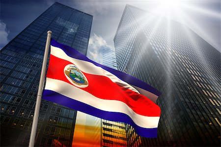 simsearch:400-07525974,k - Costa rica national flag against low angle view of skyscrapers at sunset Stock Photo - Budget Royalty-Free & Subscription, Code: 400-07526026