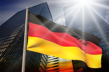 simsearch:400-07525974,k - Germany national flag against low angle view of skyscrapers at sunset Stock Photo - Budget Royalty-Free & Subscription, Code: 400-07526030