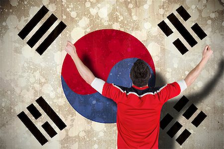 Excited football fan cheering against south korea flag Stock Photo - Budget Royalty-Free & Subscription, Code: 400-07526031