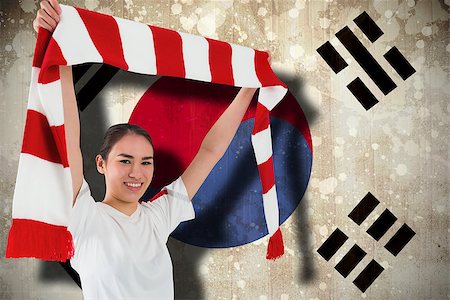 Football fan waving red and white scarf against south korea flag Stock Photo - Budget Royalty-Free & Subscription, Code: 400-07526033