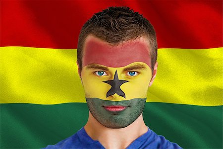 Composite image of serious young ghana fan with facepaint against digitally generated ghana national flag Stock Photo - Budget Royalty-Free & Subscription, Code: 400-07526382