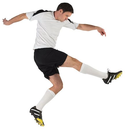 simsearch:400-07526712,k - Football player in white kicking on white background Stock Photo - Budget Royalty-Free & Subscription, Code: 400-07526733