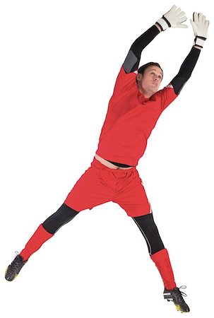 simsearch:400-07526712,k - Fit goal keeper jumping up on white background Stock Photo - Budget Royalty-Free & Subscription, Code: 400-07526799