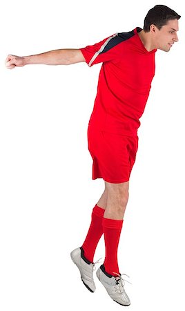 simsearch:400-07526712,k - Fit football player jumping up on white background Stock Photo - Budget Royalty-Free & Subscription, Code: 400-07526875