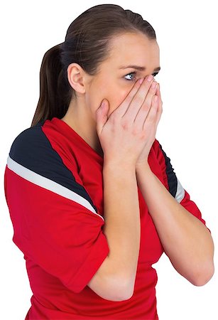 Nervous football fan in red on white Stock Photo - Budget Royalty-Free & Subscription, Code: 400-07526927