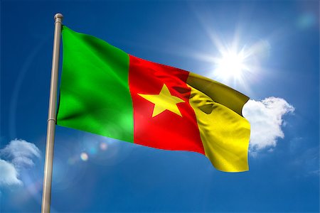 simsearch:841-02712636,k - Cameroon national flag on flagpole on blue sky background Photographie de stock - Aubaine LD & Abonnement, Code: 400-07526977