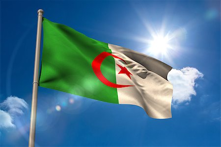 simsearch:841-02712636,k - Algeria national flag on flagpole on blue sky background Photographie de stock - Aubaine LD & Abonnement, Code: 400-07526971