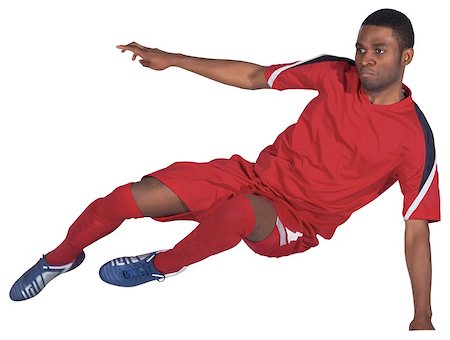 simsearch:400-07527479,k - Football player in red kicking on white background Stock Photo - Budget Royalty-Free & Subscription, Code: 400-07527101