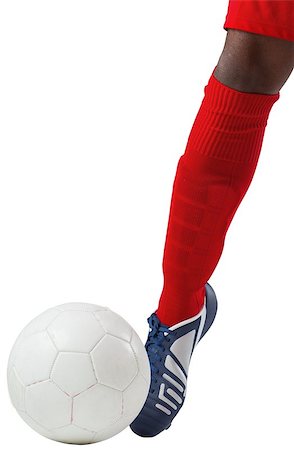 Football player kicking ball with boot on white background Stock Photo - Budget Royalty-Free & Subscription, Code: 400-07527122