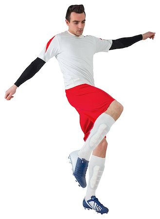 simsearch:400-07527479,k - Football player in white kicking on white background Stock Photo - Budget Royalty-Free & Subscription, Code: 400-07527204
