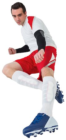 simsearch:400-07527479,k - Football player in white kicking on white background Stock Photo - Budget Royalty-Free & Subscription, Code: 400-07527206