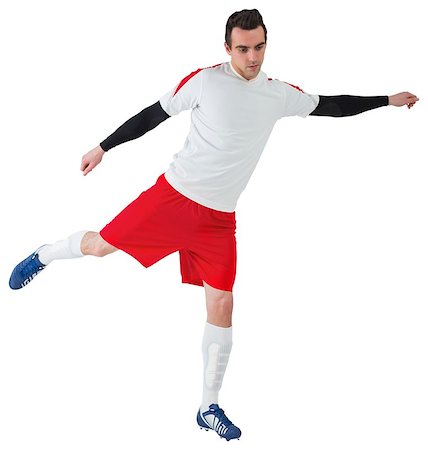 simsearch:400-07527479,k - Football player in white kicking on white background Stock Photo - Budget Royalty-Free & Subscription, Code: 400-07527203