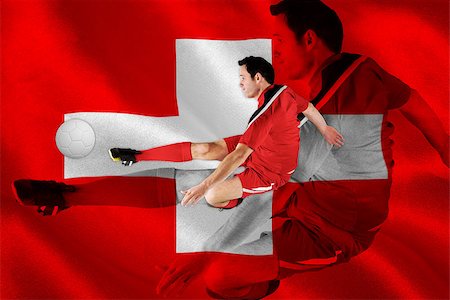 simsearch:400-07526712,k - Football player in red kicking against digitally generated swiss national flag Stock Photo - Budget Royalty-Free & Subscription, Code: 400-07527601