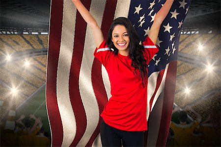 Cheering football fan in red holding usa flag against vast football stadium with fans in yellow Stock Photo - Budget Royalty-Free & Subscription, Code: 400-07527804