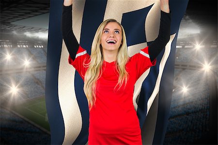 Cheering football fan in red holding greece flag against large football stadium with fans in blue Stock Photo - Budget Royalty-Free & Subscription, Code: 400-07527810
