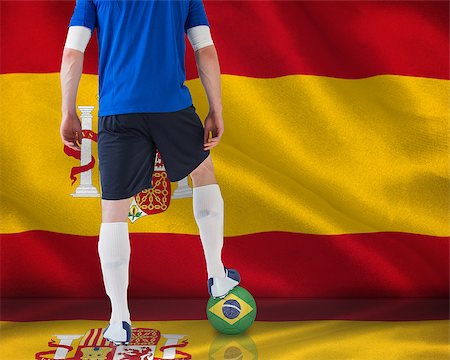 simsearch:400-07527966,k - Football player in blue jersey against digitally generated spanish national flag Foto de stock - Royalty-Free Super Valor e Assinatura, Número: 400-07527881