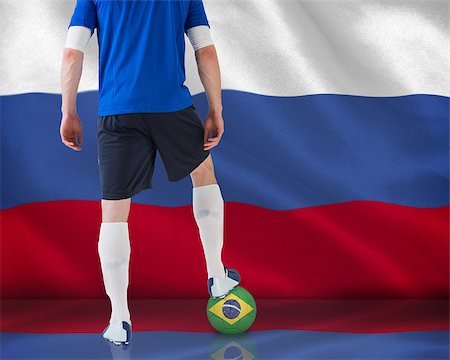 simsearch:400-07527966,k - Football player in blue jersey against digitally generated russian national flag Foto de stock - Royalty-Free Super Valor e Assinatura, Número: 400-07527882