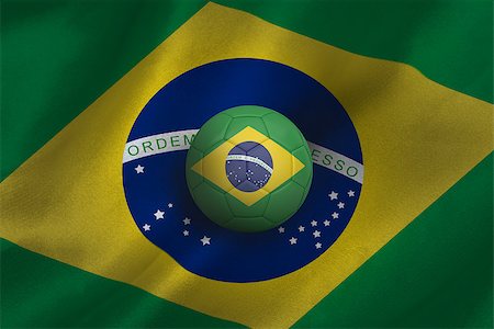 simsearch:400-07527966,k - Football in brasil colours against flag background Foto de stock - Royalty-Free Super Valor e Assinatura, Número: 400-07527928