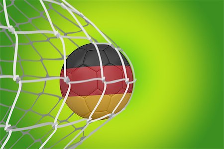 simsearch:400-07527966,k - Football in germany colours at back of net against green vignette Foto de stock - Royalty-Free Super Valor e Assinatura, Número: 400-07528121