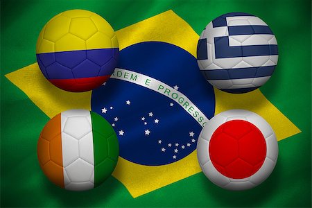 simsearch:400-07527966,k - Group c world cup footballs on brasilian flag Foto de stock - Royalty-Free Super Valor e Assinatura, Número: 400-07528264