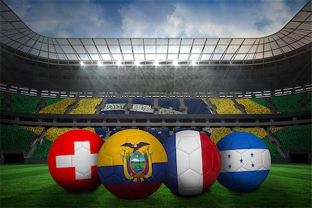 simsearch:400-07527966,k - Group e world cup footballs in large stadium Foto de stock - Royalty-Free Super Valor e Assinatura, Número: 400-07528269