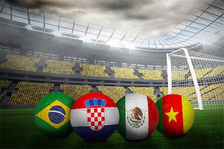 simsearch:400-04155683,k - Group a world cup footballs in large stadium Stock Photo - Budget Royalty-Free & Subscription, Code: 400-07528263