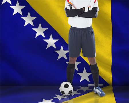 Goalkeeper in white looking at camera against digitally generated bosnian flag Photographie de stock - Aubaine LD & Abonnement, Code: 400-07528319