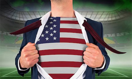 Businessman opening shirt to reveal usa flag against vast football stadium for world cup Stock Photo - Budget Royalty-Free & Subscription, Code: 400-07528354